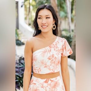 NWOT. Pink Lily Summertime Blooms Floral Cropped One Shoulder Blouse. Size S.